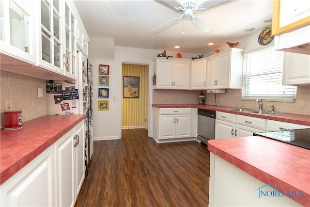 2403 Hempstead Rd, Ottawa Hills, OH 43606 - kitchen featuring stainless steel dishwasher, white cabinets, backsplash, dark wood-type flooring, and recessed lighting