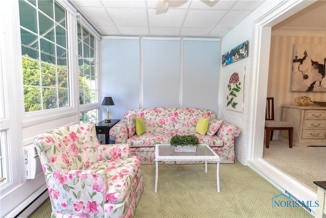 2403 Hempstead Rd, Ottawa Hills, OH 43606 - living room featuring a baseboard radiator, carpet, healthy amount of natural light, and ceiling fan