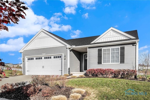 1500 Lee Ann Ave, Defiance, OH 43512 - ranch-style house with a garage, board and batten siding, concrete driveway, a front yard, and a shingled roof