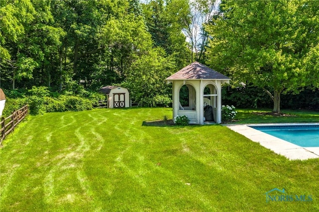 6608 Inglewood Dr, Holland, OH 43528 - view of yard with a shed and an outdoor pool