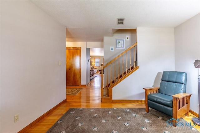 312 W Dudley St, Maumee, OH 43537 - living area featuring wood finished floors and stairway