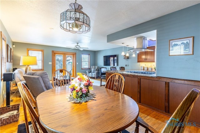 312 W Dudley St, Maumee, OH 43537 - dining area featuring light wood-style floors and a ceiling fan