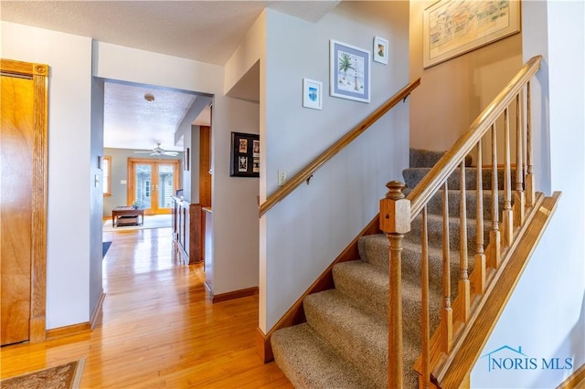 312 W Dudley St, Maumee, OH 43537 - staircase with wood finished floors and a ceiling fan
