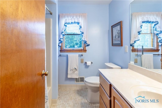 312 W Dudley St, Maumee, OH 43537 - full bath with vanity, a shower, tile patterned floors, and a bath