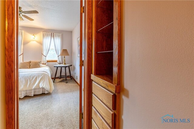 312 W Dudley St, Maumee, OH 43537 - bedroom featuring carpet flooring and a textured ceiling