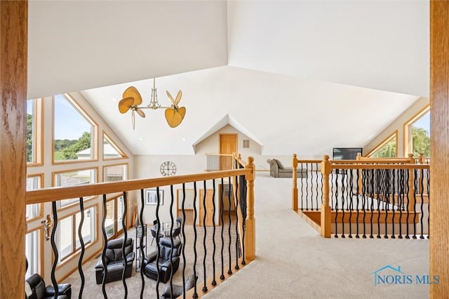 586 N State Route 587, Fostoria, OH 44830 - corridor with carpet floors, vaulted ceiling, and an upstairs landing