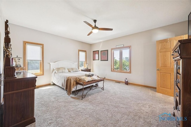 586 N State Route 587, Fostoria, OH 44830 - bedroom with carpet floors and ceiling fan
