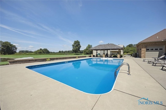 586 N State Route 587, Fostoria, OH 44830 - outdoor pool with a patio and a gazebo
