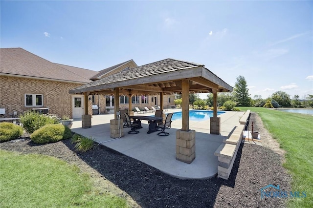 586 N State Route 587, Fostoria, OH 44830 - view of patio with a gazebo, an outdoor pool, and a water view
