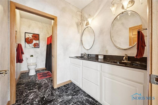 586 N State Route 587, Fostoria, OH 44830 - full bathroom with double vanity and marble look tiles