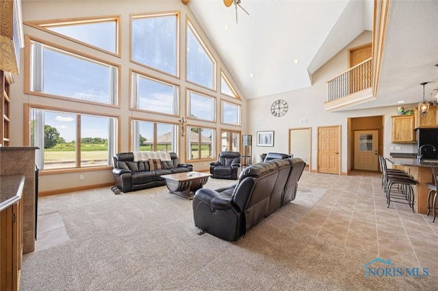 586 N State Route 587, Fostoria, OH 44830 - living room featuring high vaulted ceiling and light carpet