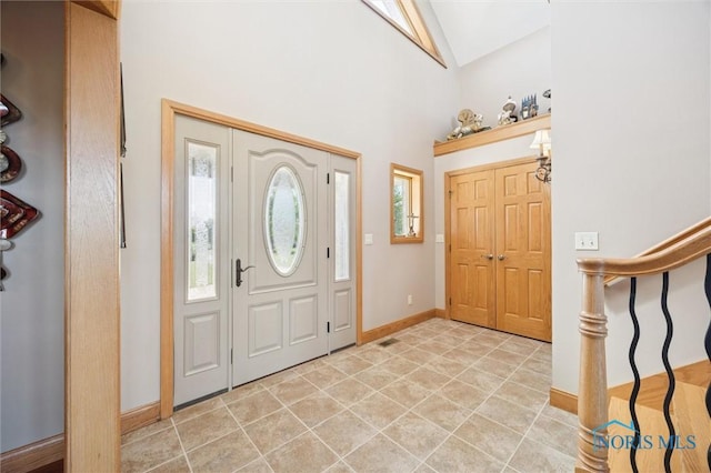 586 N State Route 587, Fostoria, OH 44830 - foyer with baseboards and high vaulted ceiling