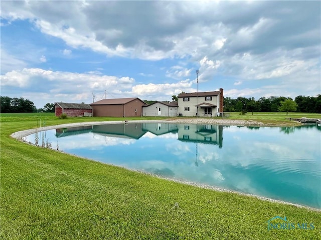 17988 Rd 156, Paulding, OH 45879 - view of swimming pool with a lawn, a pool, and a water view