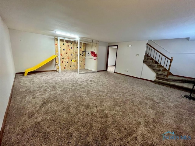 17988 Rd 156, Paulding, OH 45879 - finished below grade area featuring stairs and carpet flooring
