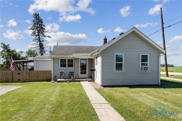 18735 Wall St, Tontogany, OH 43565 - back of house with a chimney and a shingled roof