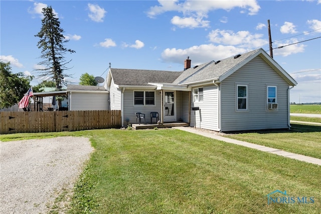 18735 Wall St, Tontogany, OH 43565 - view of front of home with roof with shingles, a chimney, and cooling unit