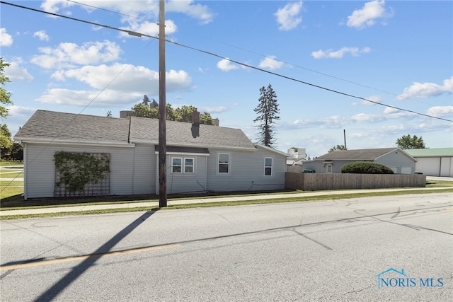 18735 Wall St, Tontogany, OH 43565 - ranch-style house featuring roof with shingles