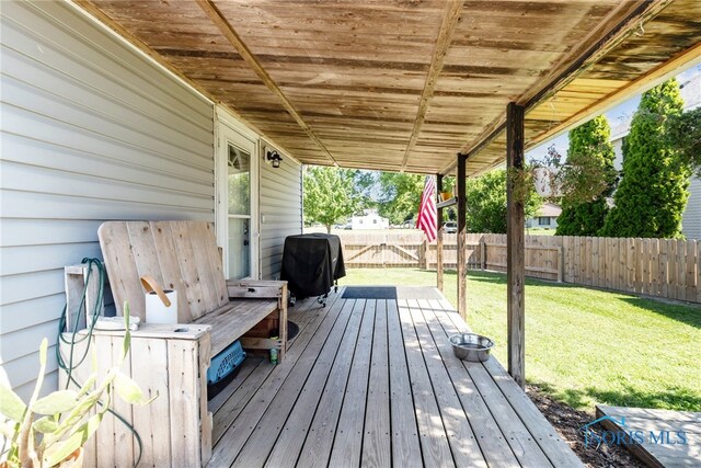 18735 Wall St, Tontogany, OH 43565 - deck with a grill and a fenced backyard