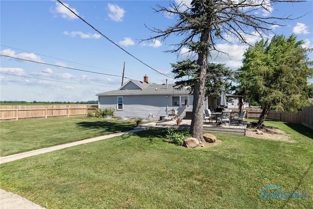 18735 Wall St, Tontogany, OH 43565 - back of house featuring a fenced backyard and a patio area