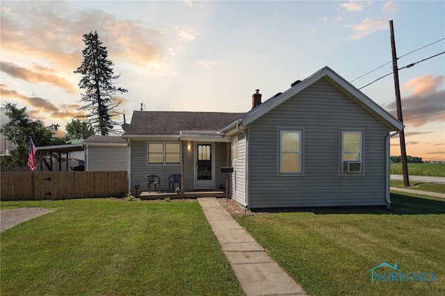 18735 Wall St, Tontogany, OH 43565 - view of front of home with a chimney and roof with shingles
