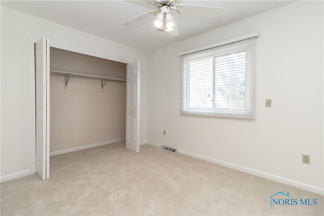 6842 Shieldwood Rd, Toledo, OH 43617 - unfurnished bedroom with light colored carpet, a closet, and ceiling fan