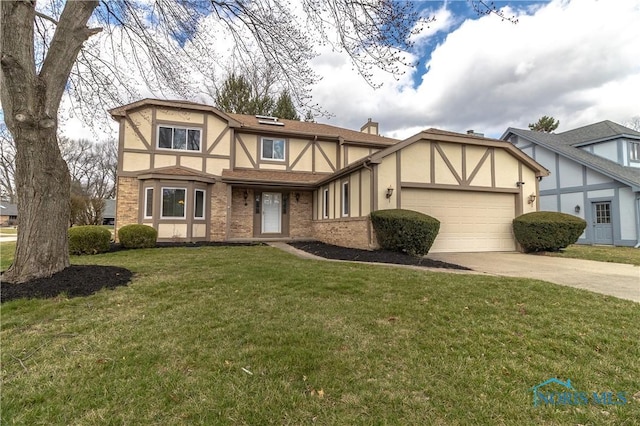 6842 Shieldwood Rd, Toledo, OH 43617 - tudor-style house with stucco siding, a garage, driveway, a front lawn, and brick siding