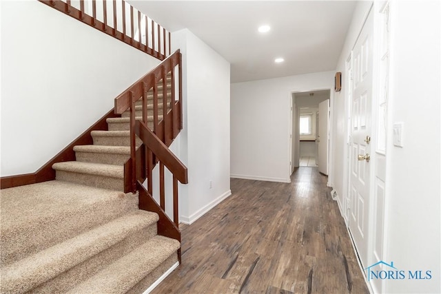 6842 Shieldwood Rd, Toledo, OH 43617 - stairs with wood finished floors and recessed lighting