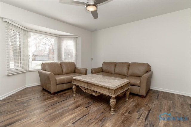 6842 Shieldwood Rd, Toledo, OH 43617 - living area with a ceiling fan and wood finished floors