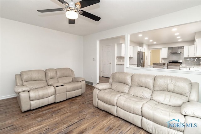 6842 Shieldwood Rd, Toledo, OH 43617 - living area featuring a ceiling fan, wood finished floors, and recessed lighting