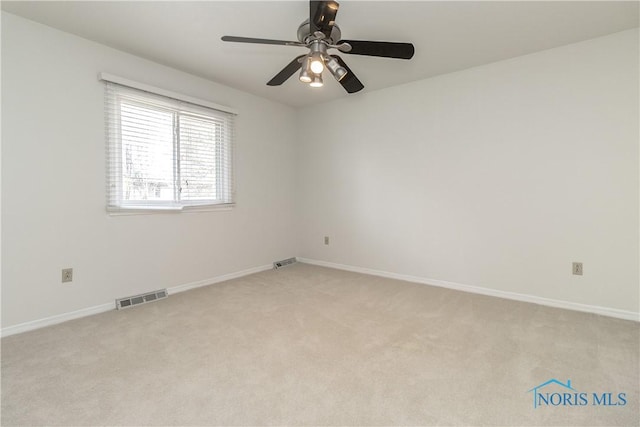 6842 Shieldwood Rd, Toledo, OH 43617 - spare room featuring a ceiling fan and light colored carpet