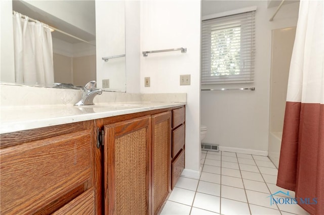 6842 Shieldwood Rd, Toledo, OH 43617 - bathroom featuring vanity, tile patterned floors, and shower / bath combo with shower curtain