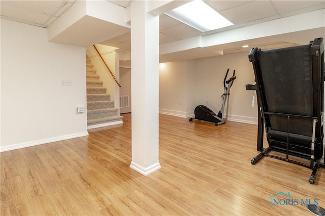 6842 Shieldwood Rd, Toledo, OH 43617 - exercise area featuring light wood-style floors and a paneled ceiling