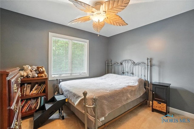 1604 White Tail Run, Findlay, OH 45840 - carpeted bedroom with a ceiling fan and baseboards