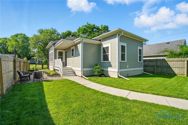 233 E 5th St, Perrysburg, OH 43551 - view of front of house featuring a fenced backyard