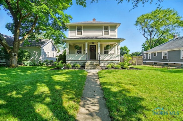 233 E 5th St, Perrysburg, OH 43551 - traditional style home with covered porch, a front lawn, and a chimney