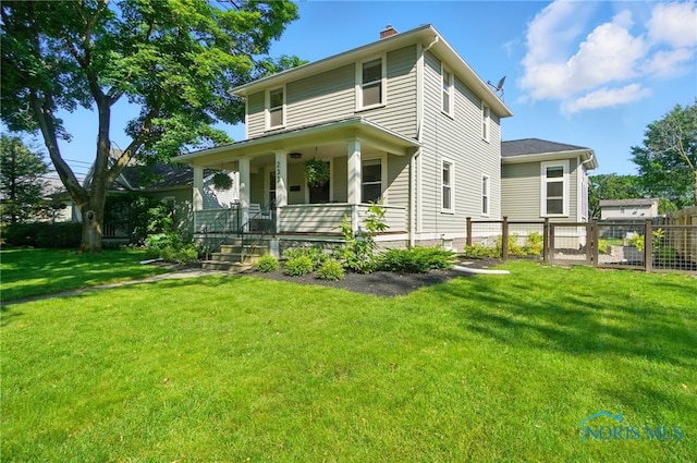 233 E 5th St, Perrysburg, OH 43551 - rear view of house featuring a porch and a chimney