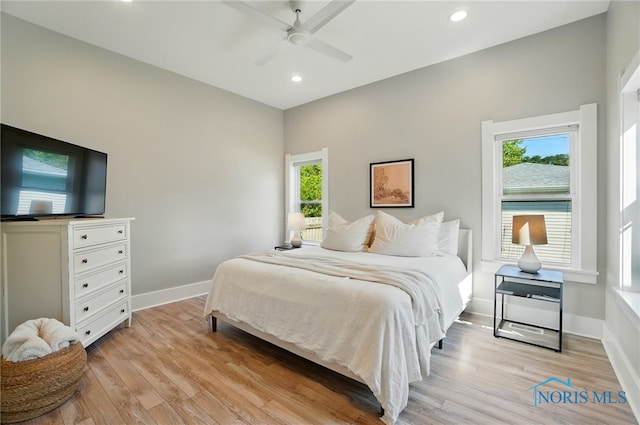 233 E 5th St, Perrysburg, OH 43551 - bedroom with light wood finished floors, recessed lighting, and a ceiling fan