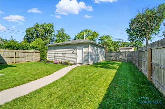 233 E 5th St, Perrysburg, OH 43551 - fenced backyard with an outdoor structure