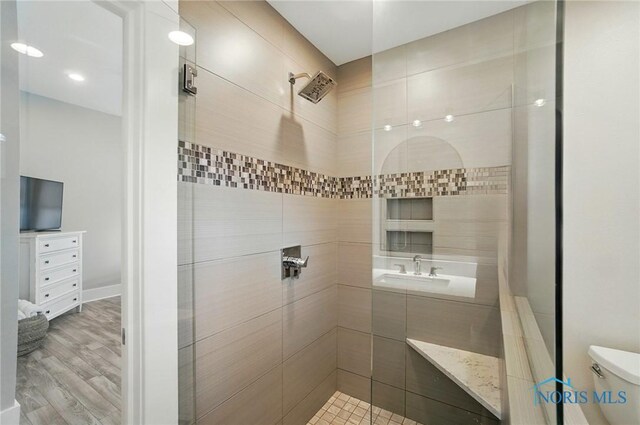 233 E 5th St, Perrysburg, OH 43551 - full bath featuring tiled shower and wood finished floors