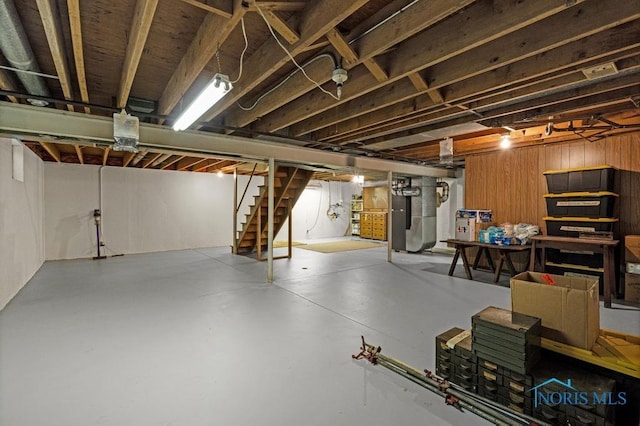 5941 Indian Trl, Sylvania, OH 43560 - unfinished basement featuring stairs, heating unit, and wood walls