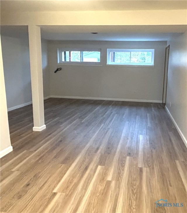 813 Maple Ln, Waterville, OH 43566 - below grade area featuring wood finished floors and baseboards