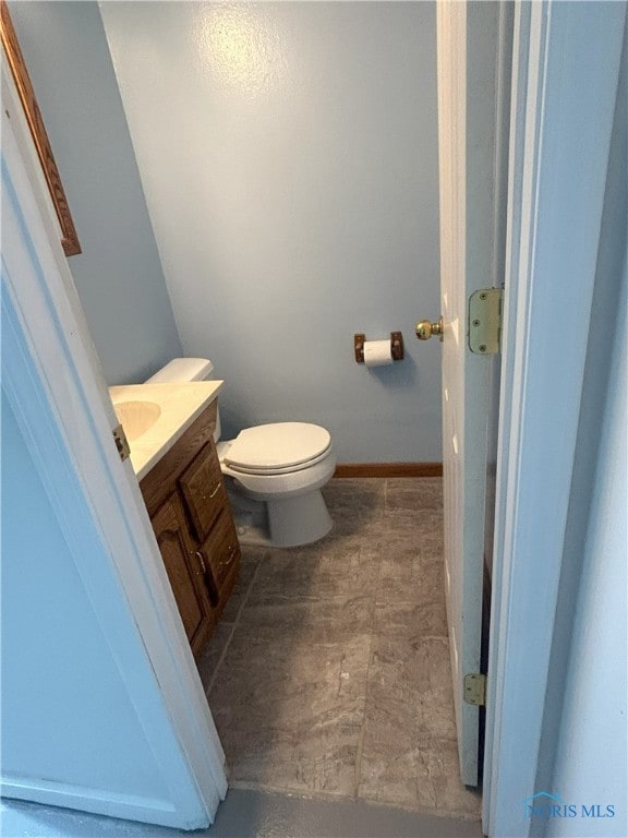813 Maple Ln, Waterville, OH 43566 - bathroom with vanity and toilet