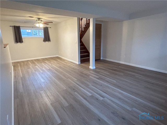 813 Maple Ln, Waterville, OH 43566 - basement with stairway and dark wood finished floors