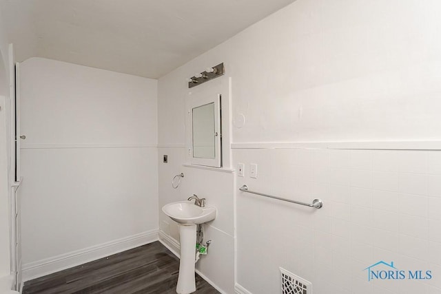 708 Spencer St, Toledo, OH 43609 - bathroom featuring wood finished floors and a sink