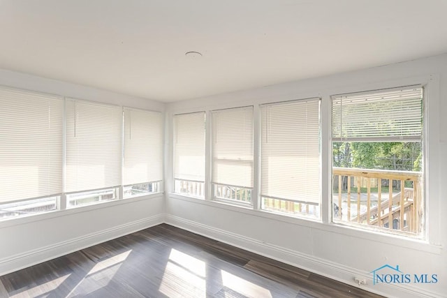 708 Spencer St, Toledo, OH 43609 - unfurnished sunroom featuring plenty of natural light
