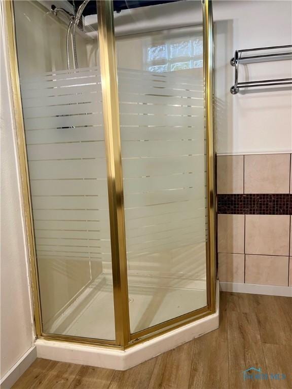 4846 Amesbury Rd, Toledo, OH 43612 - full bath featuring wood finished floors and a stall shower