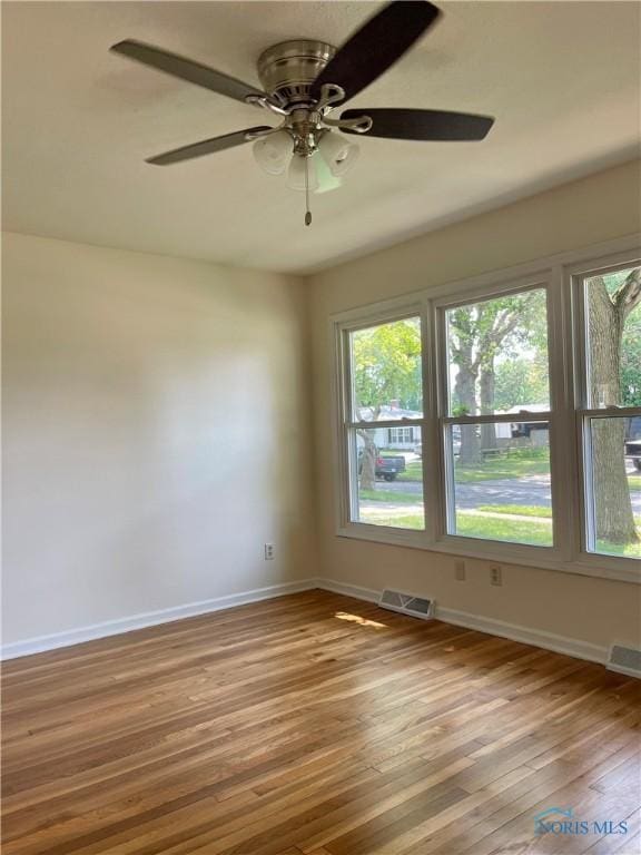 4846 Amesbury Rd, Toledo, OH 43612 - unfurnished room with hardwood / wood-style floors and ceiling fan