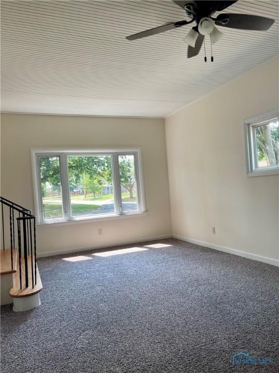4846 Amesbury Rd, Toledo, OH 43612 - carpeted spare room with a ceiling fan and baseboards