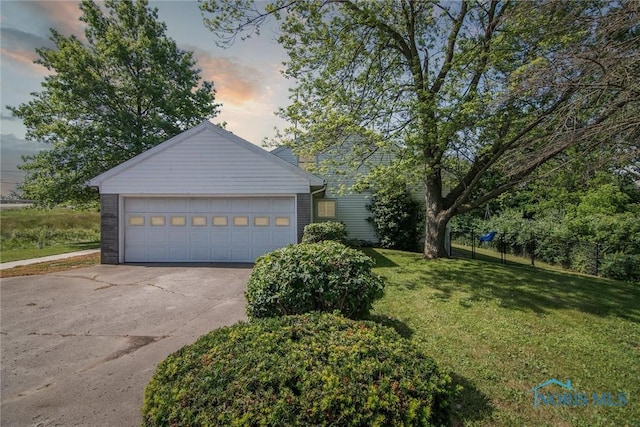 12982 State Route 34, Bryan, OH 43506 - view of front of property with a front yard and a garage