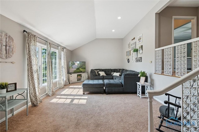 12982 State Route 34, Bryan, OH 43506 - carpeted living room with vaulted ceiling and baseboards